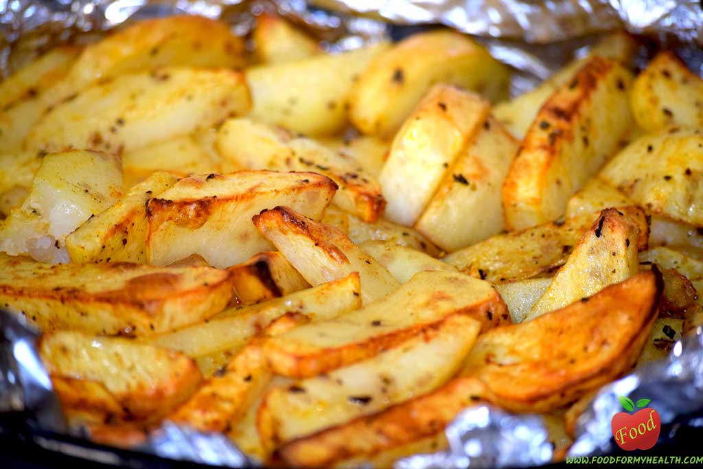 Spicy roasted potatoes with vegetables