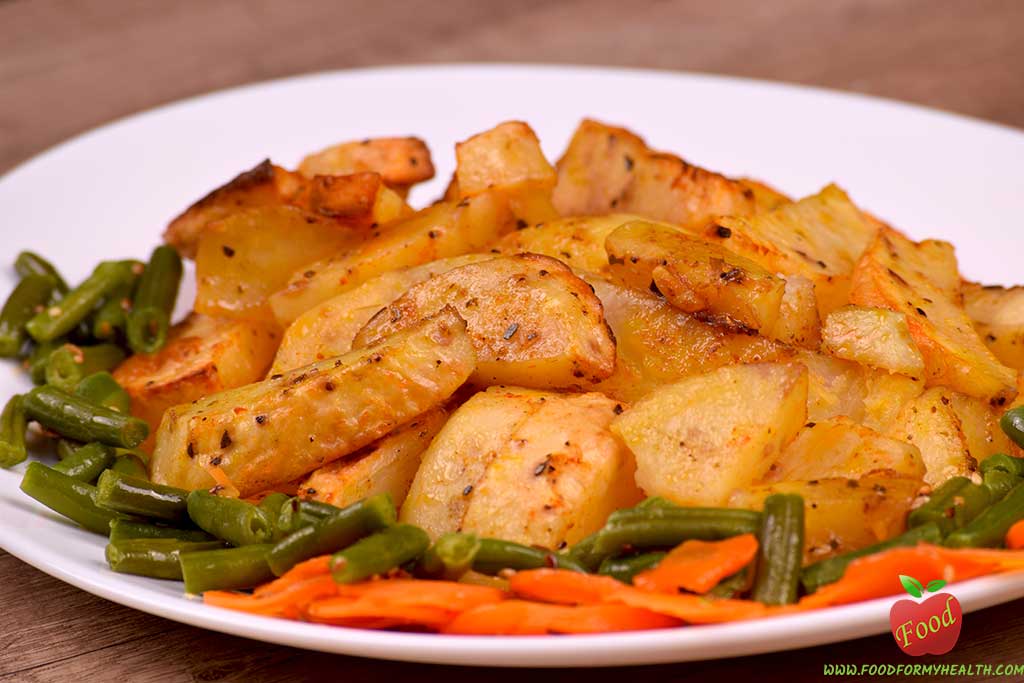 Spicy roasted potatoes with vegetables